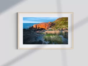 Sunset-Beach landscape photo print with sunlit rocks.